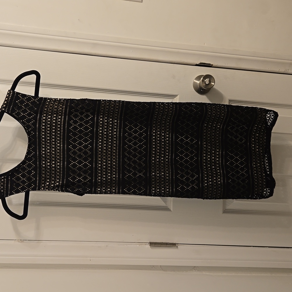 Women's black lace dress with open back, size large